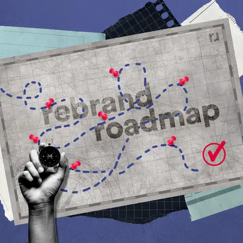 map with the words rebrand roadmap and a hand holding a compass